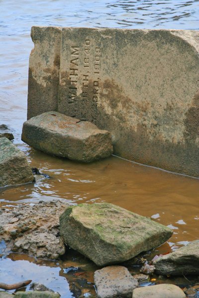 Tombstones along the Delaware River shoreline